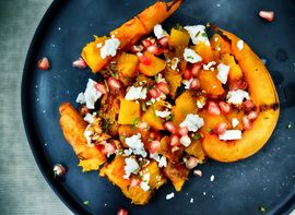 Pumpkin Tasty pumpkin dish on a dark blue plate.
