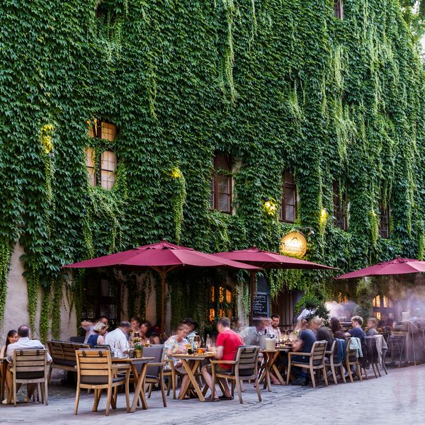 Popular outdoor terrace of the restaurant Pfistermühle at the Platzl Hotel.